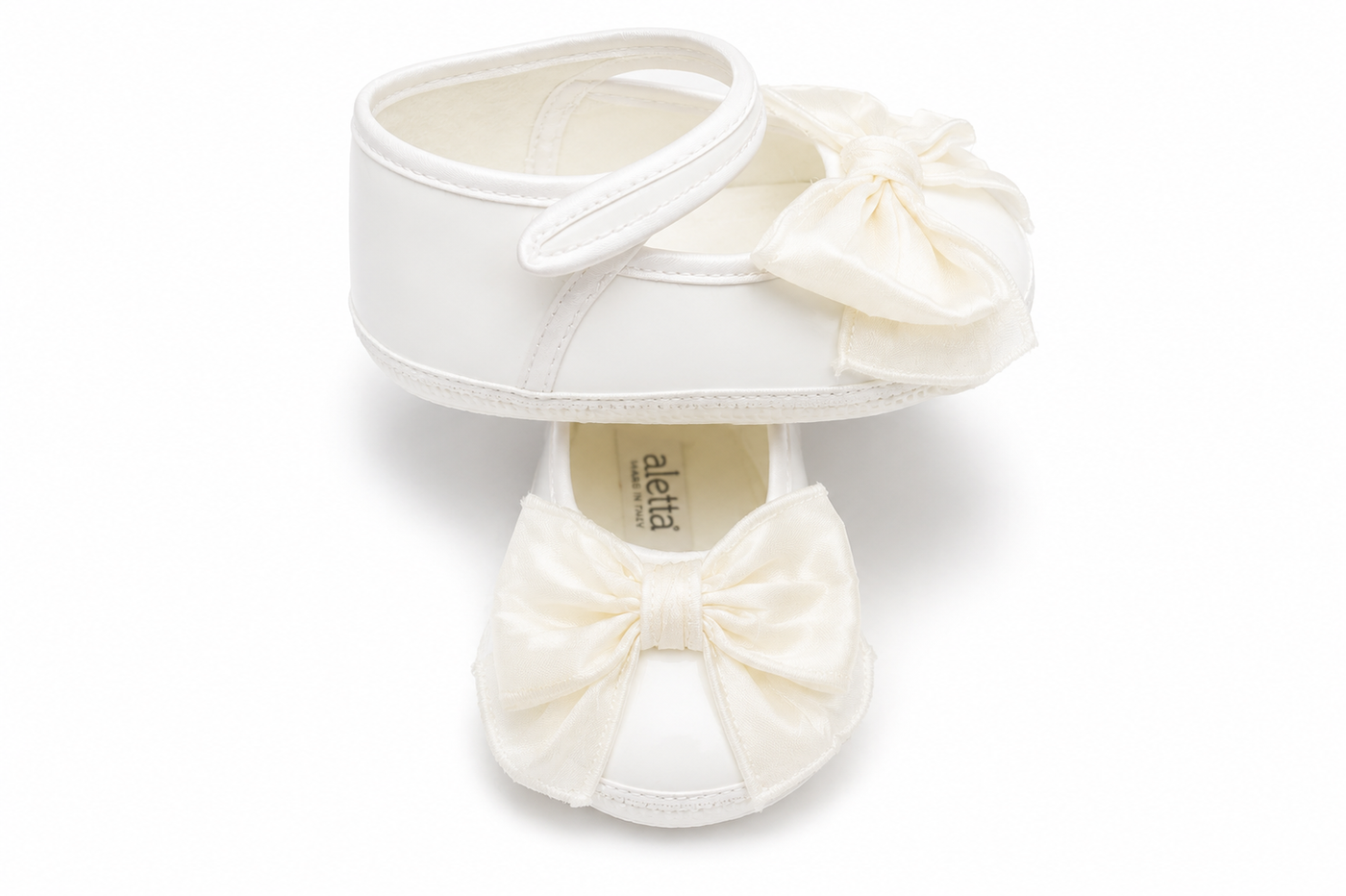 Ballerine Neonata Bianche con Cinturino e Maxi Fiocco – Aletta