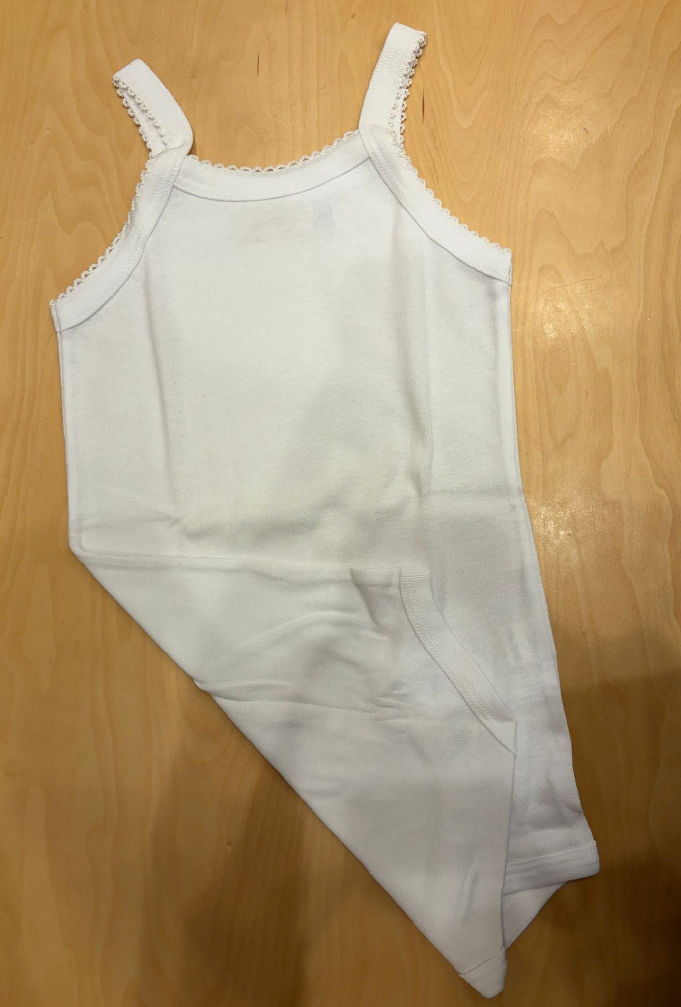 Body neonata bianco in cotone con spalline