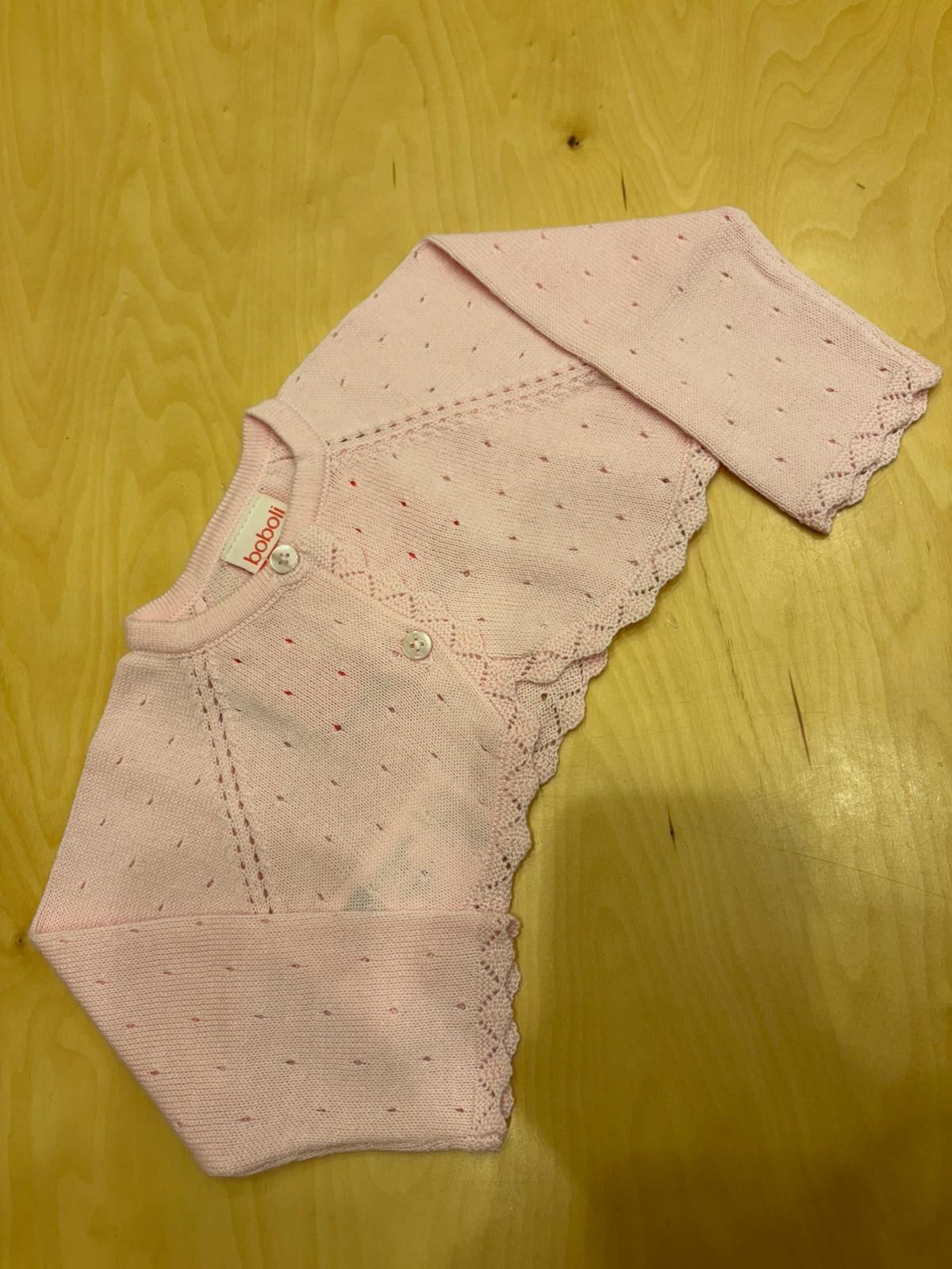 Cardigan neonata rosa traforato con bordo decorato – Boboli