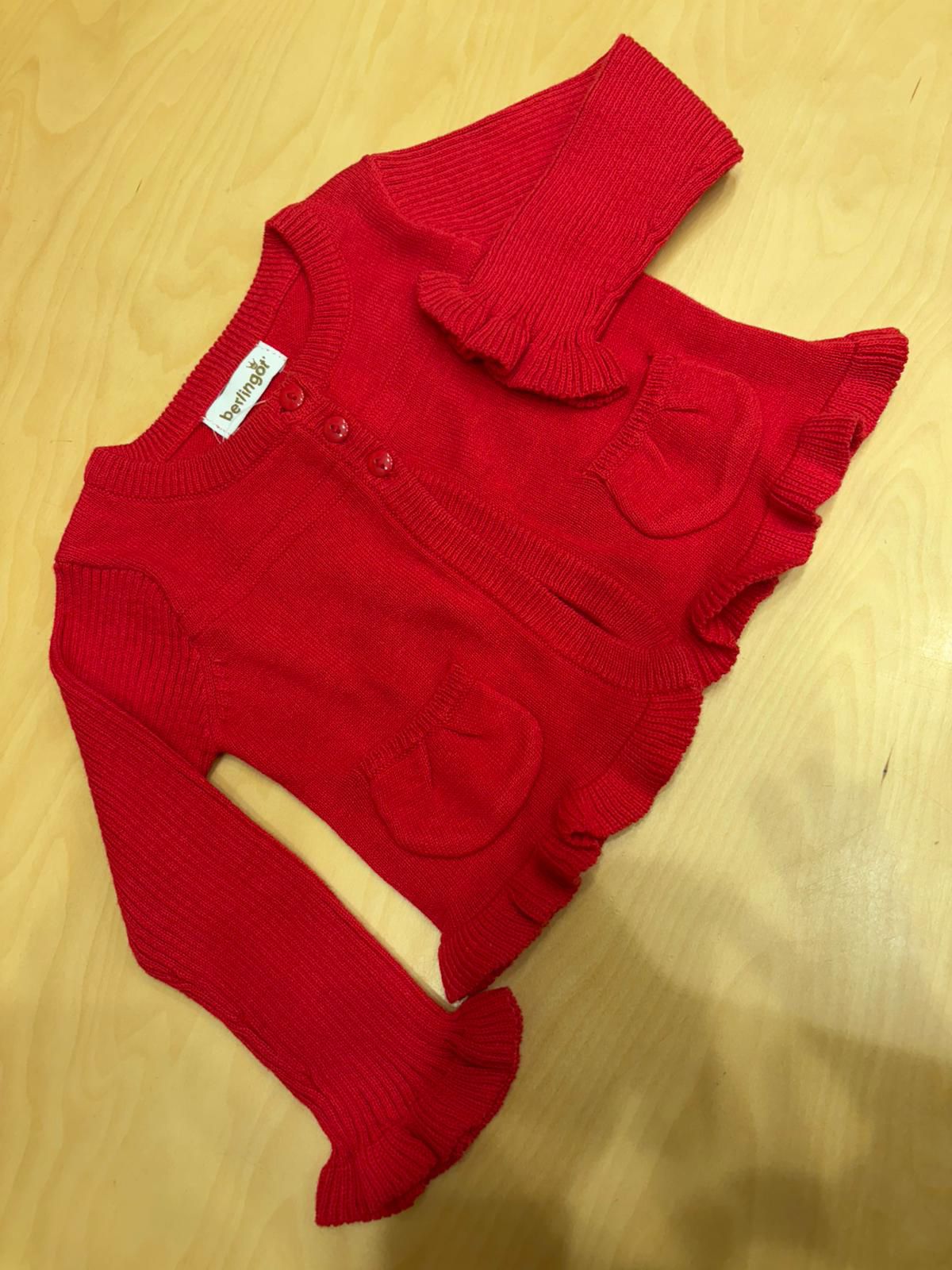 Cardigan neonata rosso con taschine e balze – Berlingot
