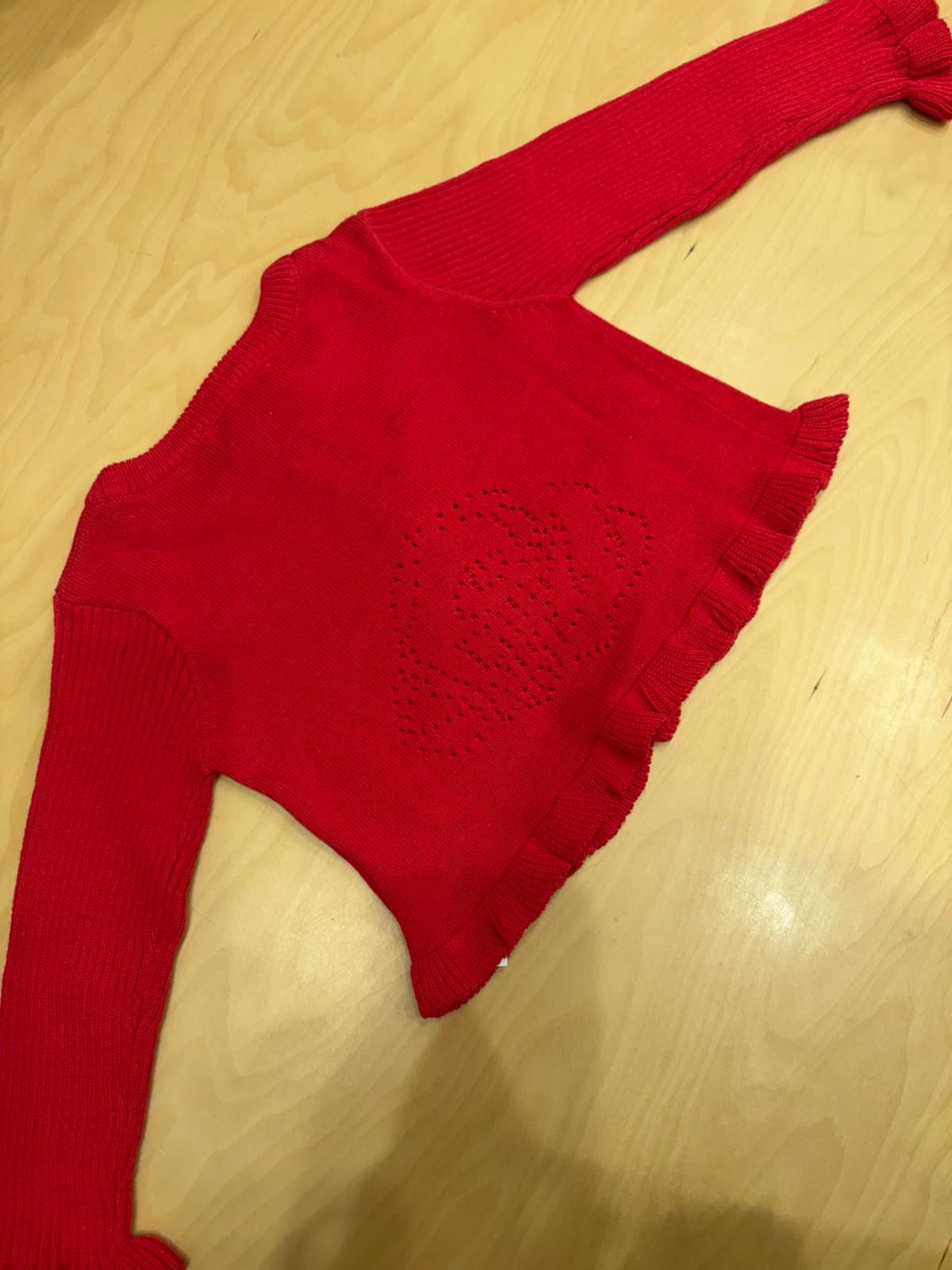 Cardigan neonata rosso con taschine e balze – Berlingot